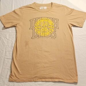 Woman's medium tan Dutch Bros shirt with minor stain